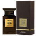 A 100ml bottle of Tom Ford Tuscan Leather Eau de Parfum, with a brown box packaging featuring the brand and product name.