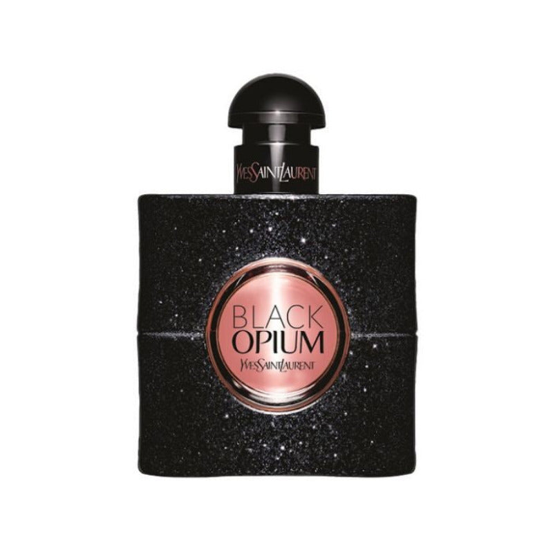 A black bottle of Black Opium Eau de Parfum by Yves Saint Laurent with a sparkling label and a gold cap.