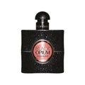 A black bottle of Black Opium Eau de Parfum by Yves Saint Laurent with a sparkling label and a gold cap.
