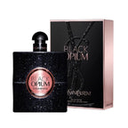 A bottle of Black Opium eau de parfum by Yves Saint Laurent with a sparkling, black opal-like pattern on the bottle, accompanied by the product box.