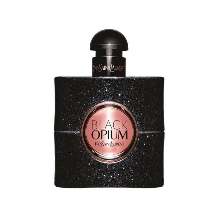 A bottle of Black Opium Eau de Parfum by Yves Saint Laurent with a black sparkling design and a gold label.